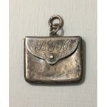 AN EARLY 20TH CENTURY SILVER PENDANT FORMED AS AN ENVELOPE Most likely used for carrying stamps, the