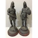 A PAIR OF VICTORIAN SPELTER FIGURES In the form of 14th/15th Century Persian soldiers, both raised