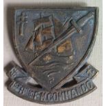 A WORLD WAR II FREE FRENCH NAVY COMMANDO BADGE Shield form and embossed with a galleon ship and