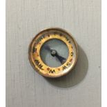 A WORLD WAR II S.O.E BRASS 'ESCAPE EVAISON' COMPASS With glass top and bottom (S.O.E = Special