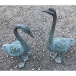 A PAIR OF NEAR LIFE SIZE VERDIGRIS BRONZE STATUES OF GEESE. (72cm)
