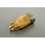 AN EARLY 20TH CENTURY TAXIDERMY OTTER PAD BROOCH Silver mounted and inscribed 'EJ 27-6-23'. (l 8cm)