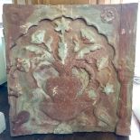 A LARGE DECORATIVE ANTIQUE INDIAN STONE PANEL Carved in relief with flowers in a vase and other