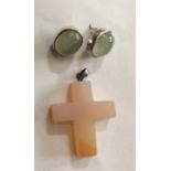 A VINTAGE HARDSTONE AND SILVER CRUCIFIX Together with a pair of green hardstone earrings, set in