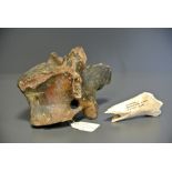 AN ICE AGE MAMMOTH VERTEBRA Along with a fossilized bone (possibly from a Baby Musk Ox). (Mammoth