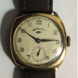 A VINTAGE 9CT GOLD ROTARY WRISTWATCH The square dial with Arabic numerals, together with twelve