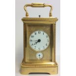 RODANET, PARIS, A 19TH CENTURY GILDED BRONZE REPEATING CARRIAGE CLOCK Having a subsidiary dial,