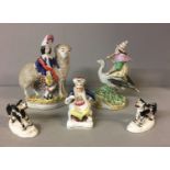 STAFFORDSHIRE, FIVE VARIOUS ITEMS Comprising two dogs, a Turkish Sultan, mother goose and a Scottish