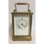 A LARGE LATE 19TH/ 20TH CENTURY BRASS CHIMING CARRIAGE CLOCK. (13cm x 9cm x 8cm)