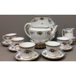 A 20TH CENTURY SPODE PORCELAIN TEA SERVICE Trapnell Spray pattern, comprising a teapot, five cups,