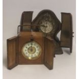 TWO 19TH CENTURY TRAVELLING CLOCKS White metal and walnut cased. (l 12cm)