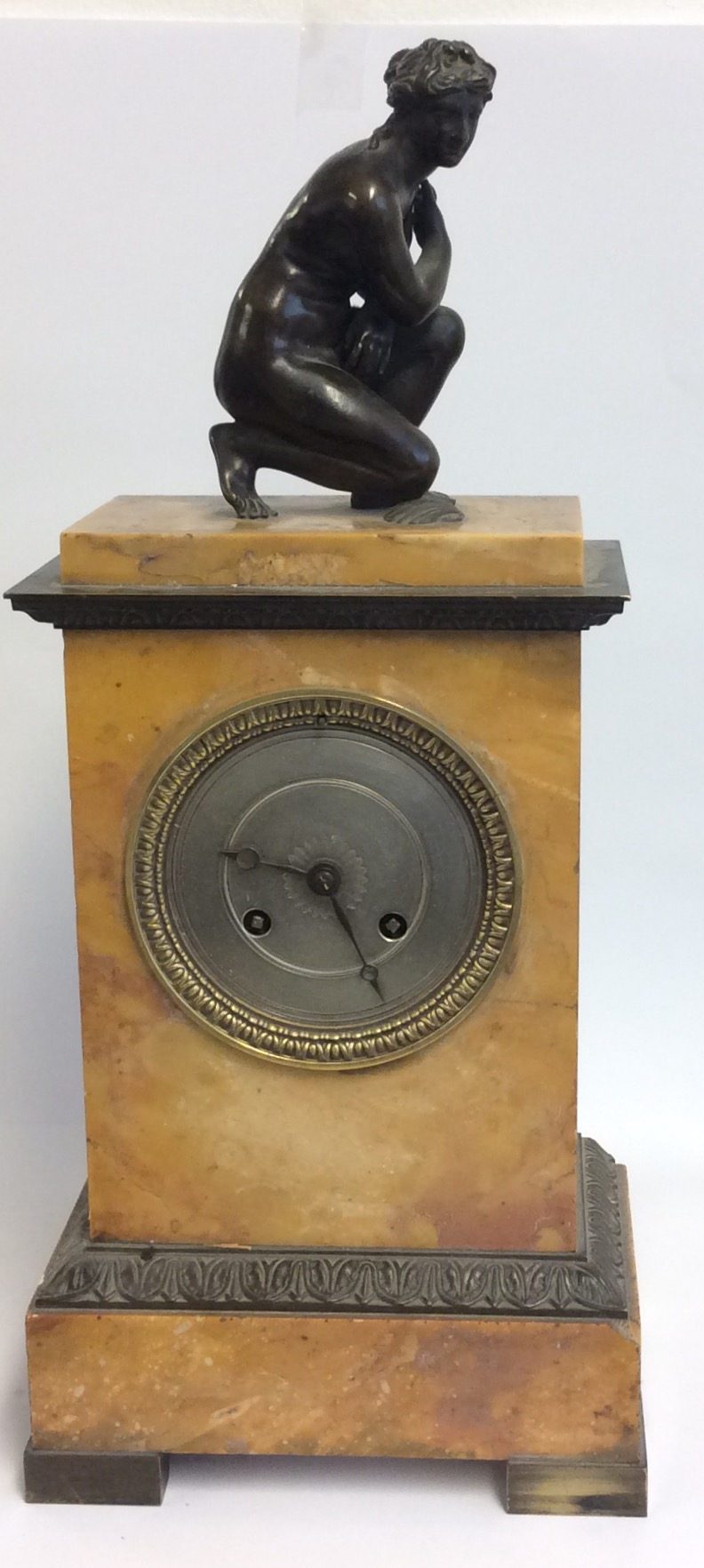 A 19TH CENTURY FRENCH MARBLE AND BRONZE MANTEL CLOCK The case having case bronze inserts and a