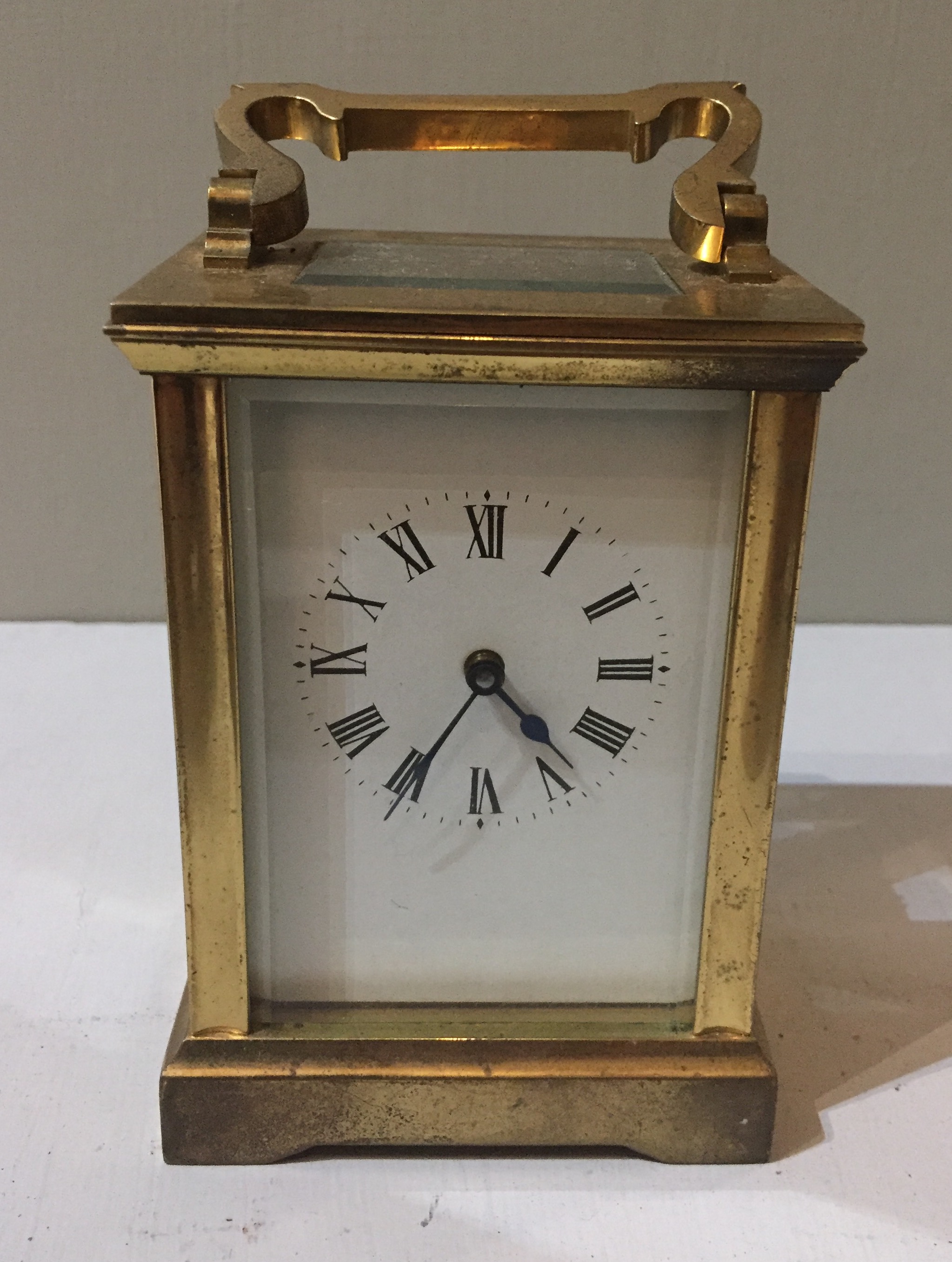 A LATE 19TH/20TH CENTURY BRASS CASED CARRIAGE CLOCK. (11.5cm x 6cm x 8cm)