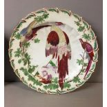 A PAIR OF CHELSEA RED ANCHOR PERIOD PLATES Painted with an exotic pheasant. (d 22cm)