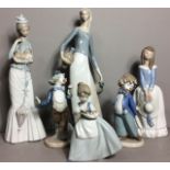 LLADRO, A VINTAGE PORCELAIN FIGURE OF AN EDWARDIAN STYLE MAIDEN Carrying a parasol and clutching a