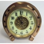 A 19TH CENTURY GILT BRASS HORSESHOE FORM MANTLE CLOCK The cylinder movement marked 'S. Frères &