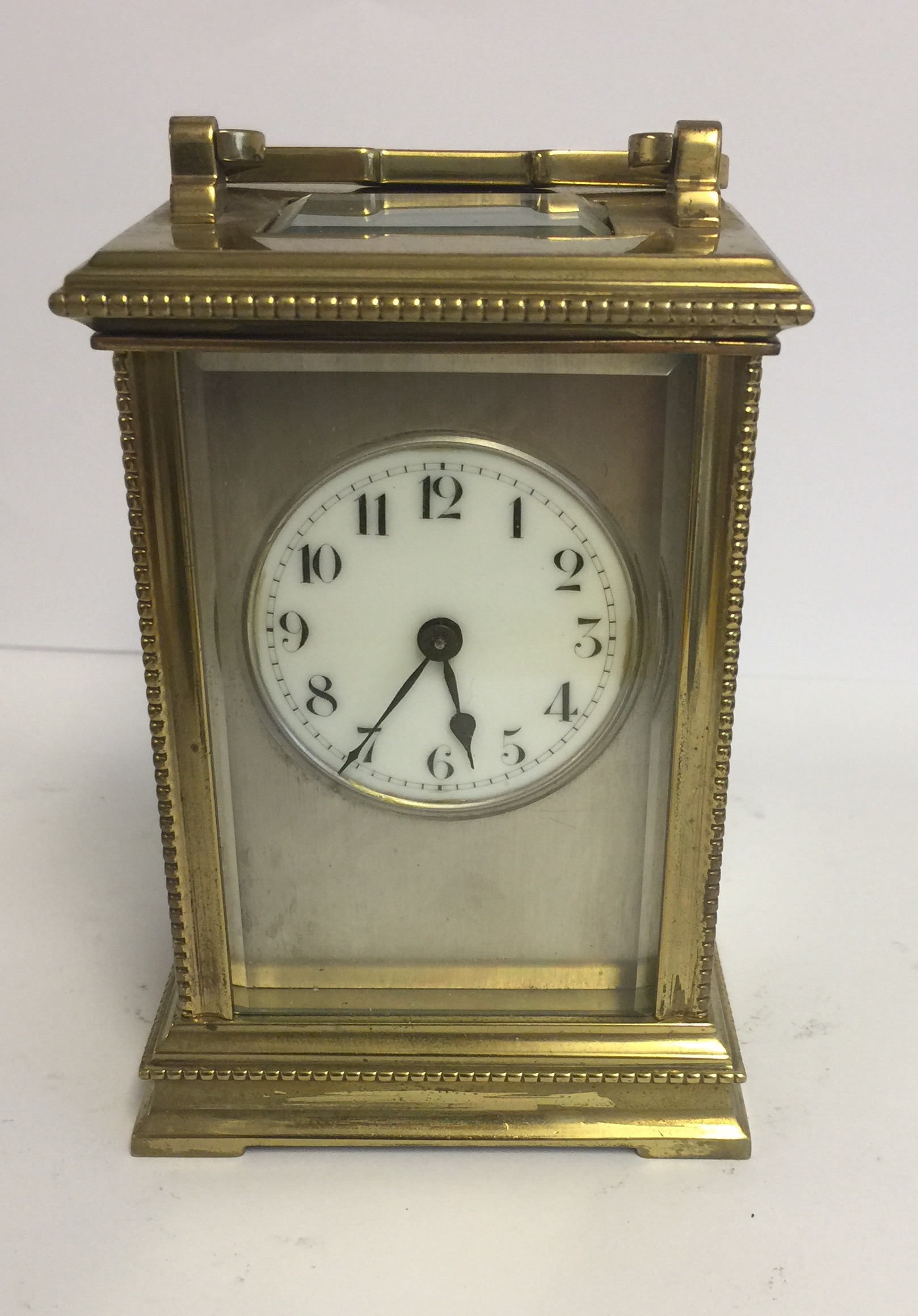 A 19TH CENTURY BRASS & SILVERED CASED CARRIAGE CLOCK. (12cm x 8cm x 7cm)