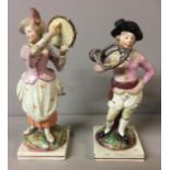 STAFFORDSHIRE, A PAIR OF 19TH CENTURY FIGURES OF MUSICIANS To include a female tambourine player and