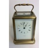 HENRY MARC, PARIS, A 19TH CENTURY GILDED BRASS CHIMING CARRIAGE CLOCK Four bevelled glass panels,