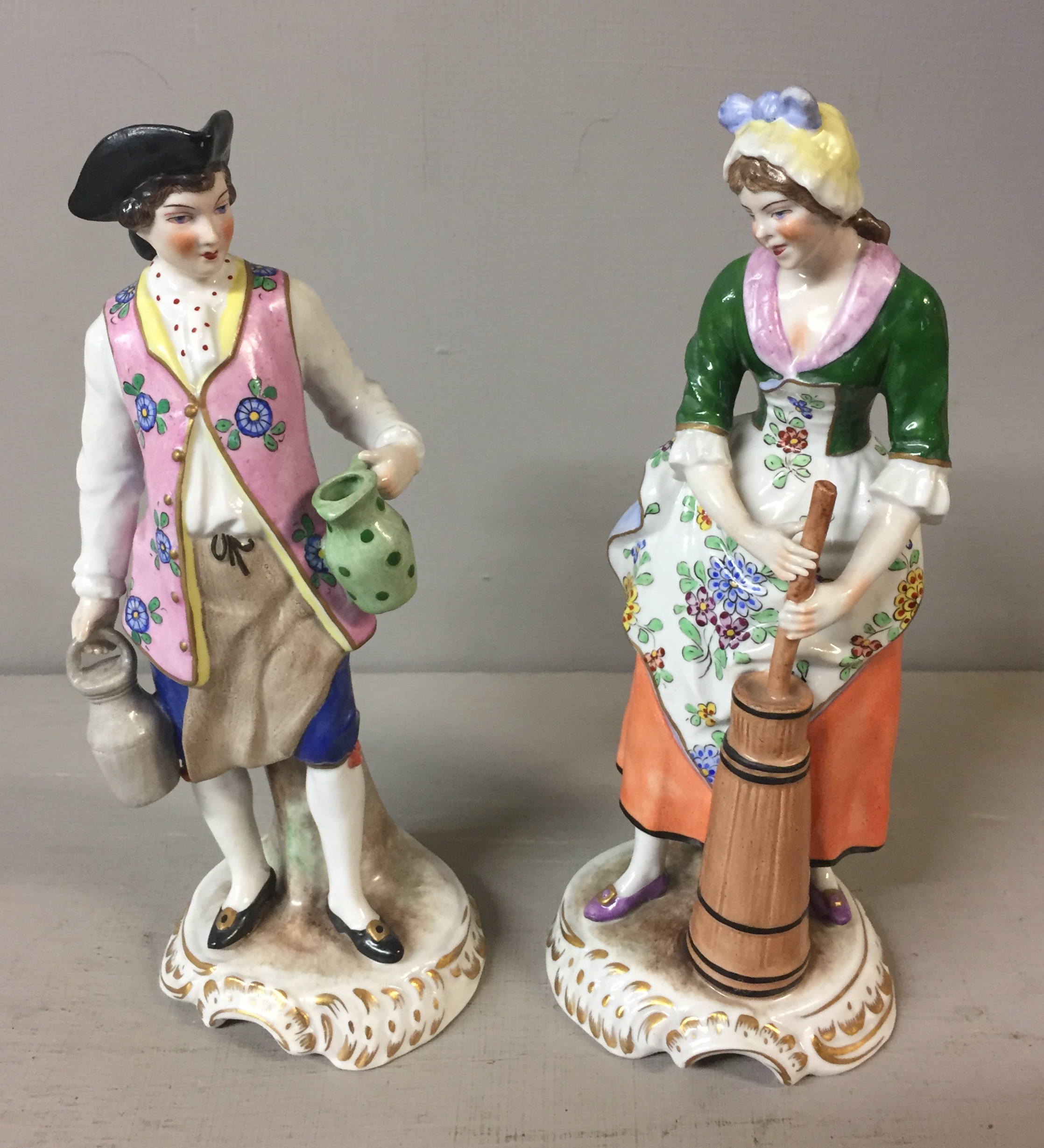 SITZENDORF, A PAIR OF EARLY 20TH CENTURY PORCELAIN FIGURES Of an 18th Century dairyman and a