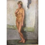 A 20TH CENTURY OIL ON CANVAS Study of a female nude in a standing pose, indistinctly signed lower