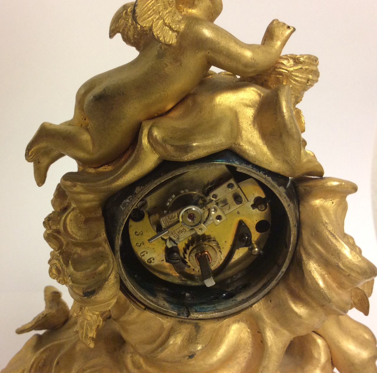 A 19TH CENTURY BRONZE ORMOLU AND MARBLE GLOBE DESK CLOCK Mounted with a winged cherub and a birds - Image 3 of 4