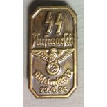 AN EARLY 20TH CENTURY GERMAN SS AUFMARSCH RECTANGULAR BADGE Bearing the German eagle and swastika