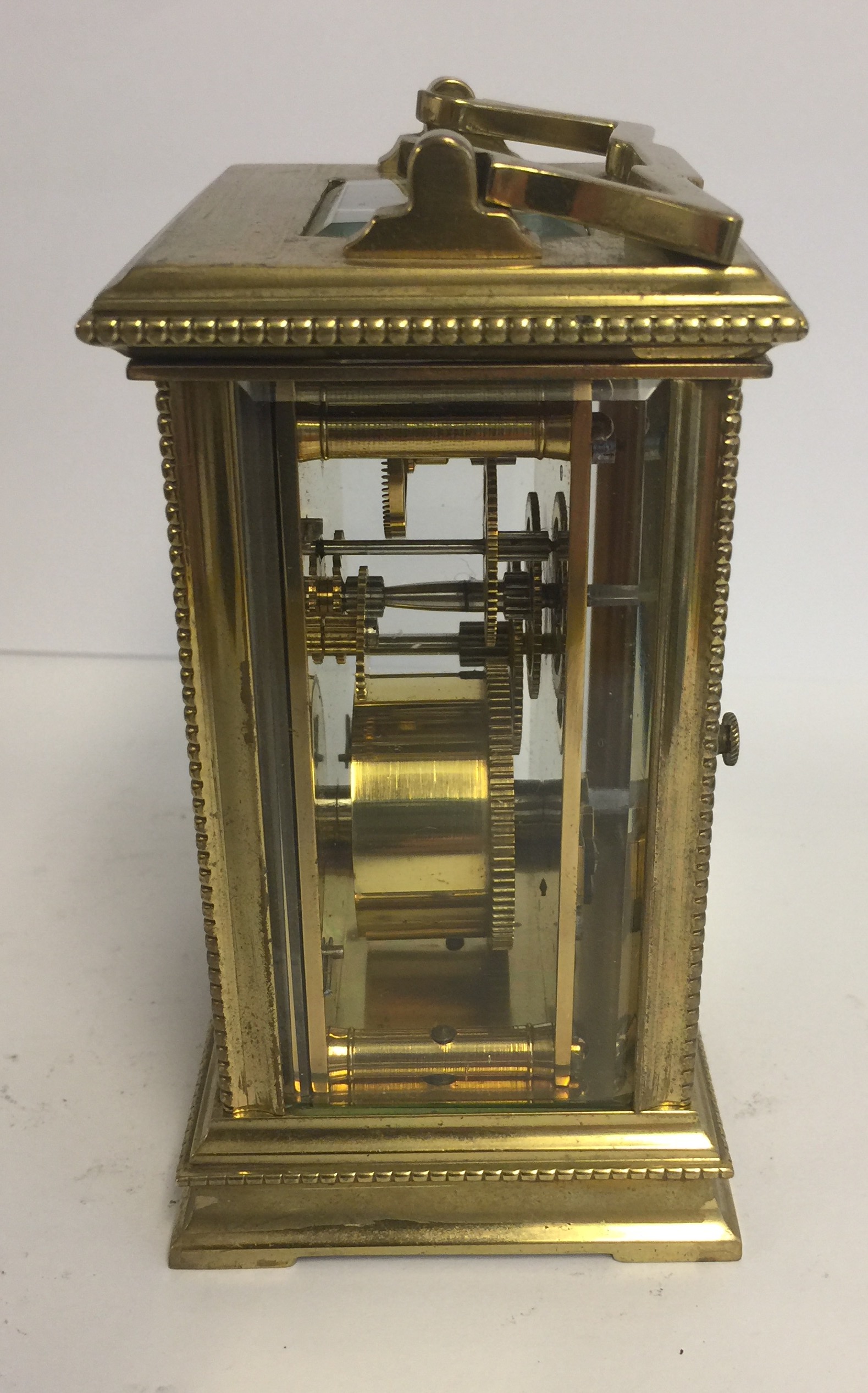 A 19TH CENTURY BRASS & SILVERED CASED CARRIAGE CLOCK. (12cm x 8cm x 7cm) - Image 3 of 3