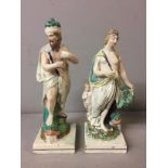 STAFFORDSHIRE, A PAIR OF 19TH CENTURY FIGURES 'Possiden' and 'Aphrodite'. (23cm)