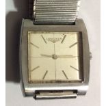 LONGINES, A VINTAGE STAINLESS STEEL GENTLEMEN'S WRISTWATCH The square silver tone dial with steel
