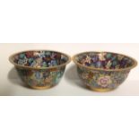 A PAIR OF CHINESE CLOISONNÉ BOWLS Decorated with a floral design, on a gilt ground. (approx 10cm)