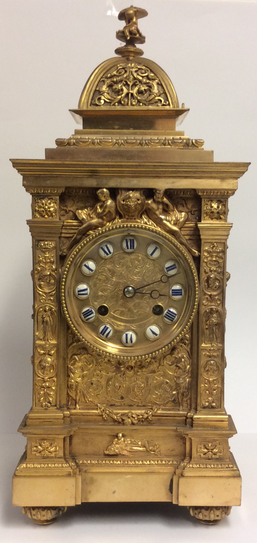 JAPY FRÈRES ET CIE, A 19TH CENTURY GILDED BRONZE MANTLE CLOCK Having a dome top set with crouching