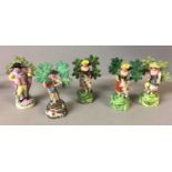 STAFFORDSHIRE, FOUR 19TH CENTURY FIGURES OF COUNTRY FOLK All with brocage background (possibly