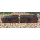 A PAIR OF 19TH/20TH CENTURY CHINESE TRAVELLING TRUNKS In distressed lacquered finish, with brass