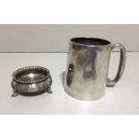 AN EARLY 20TH CENTURY CHRISTENING MUG Of tapering form, sold together with a white metal mustard