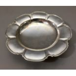 MAPPIN & WEBB, AN EARLY 20TH CENTURY SILVER DISH In the form of a stylized flower with shaped