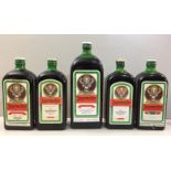 FIVE 70CL BOTTLES OF JAGERMEISTER Sold together with a larger 1.14cl bottle.