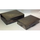 TWO EARLY 20TH CENTURY SILVER RECTANGULAR CIGARETTE BOXES With engine turned decoration.