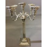 A NEOCLASSICAL STYLE SILVER PLATED CANDELABRA The four branches with Corinthian capital sconces,