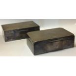 TWO EARLY ART DECO SILVER CIGARETTE BOXES With chamfered corners and a plain rectangular box, both