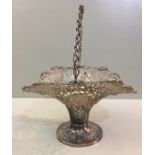 GEORGE NATHAN & RIDLEY HAYES, AN EDWARDIAN SILVER CAKE BASKET Decorated with pierced scrolls,