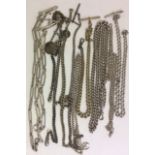 A COLLECTION OF VICTORIAN SILVER ALBERT CHAINS Including two dog link chains, a silver gilt chain