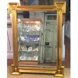 AN ITALIAN DESIGN GILT FRAMED MIRROR