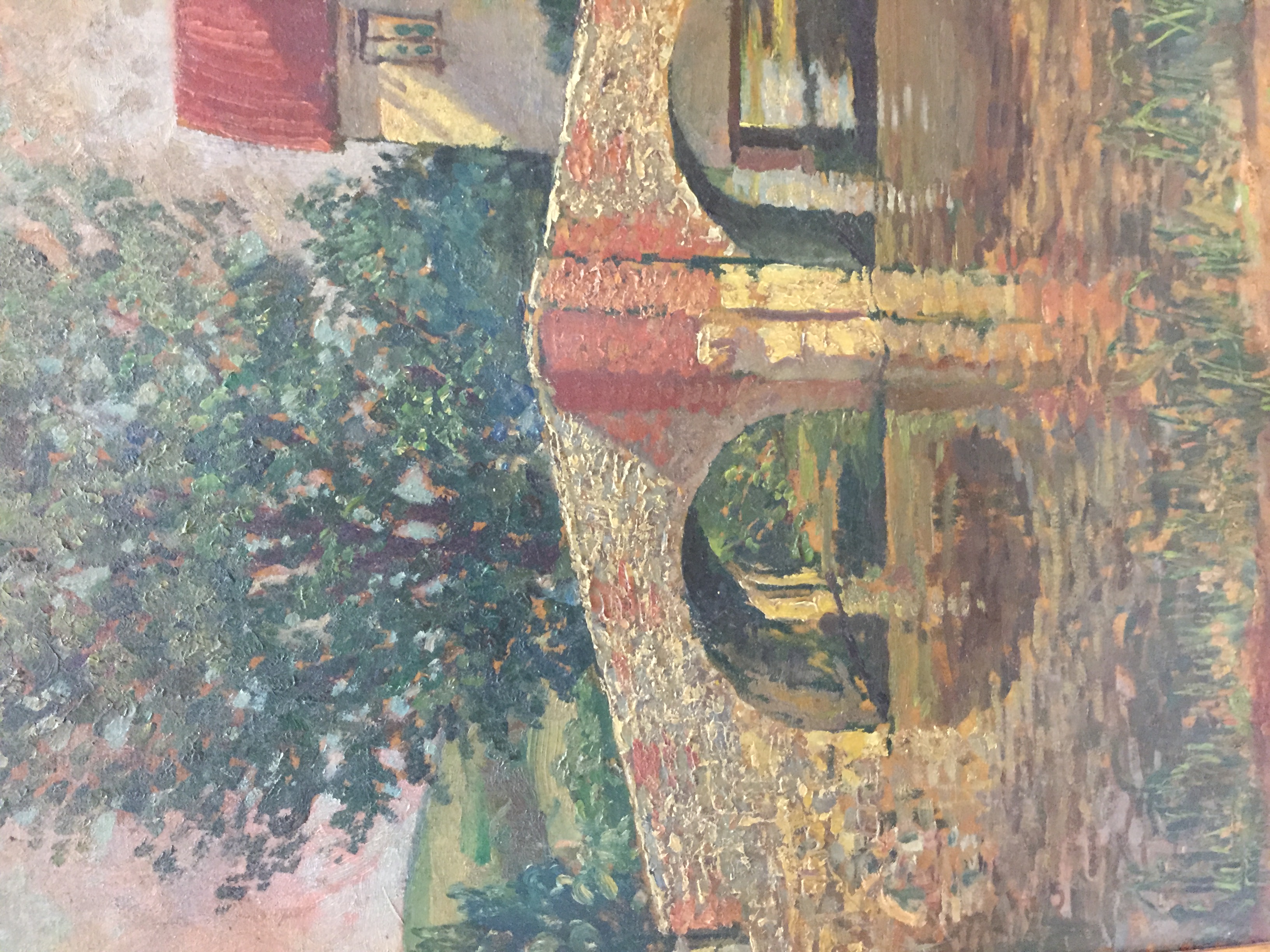 A MODERN BRITISH SCHOOL OIL ON CANVAS 'Bridge over a stream by a mill', Circa 1930 and framed. (63cm - Image 2 of 3