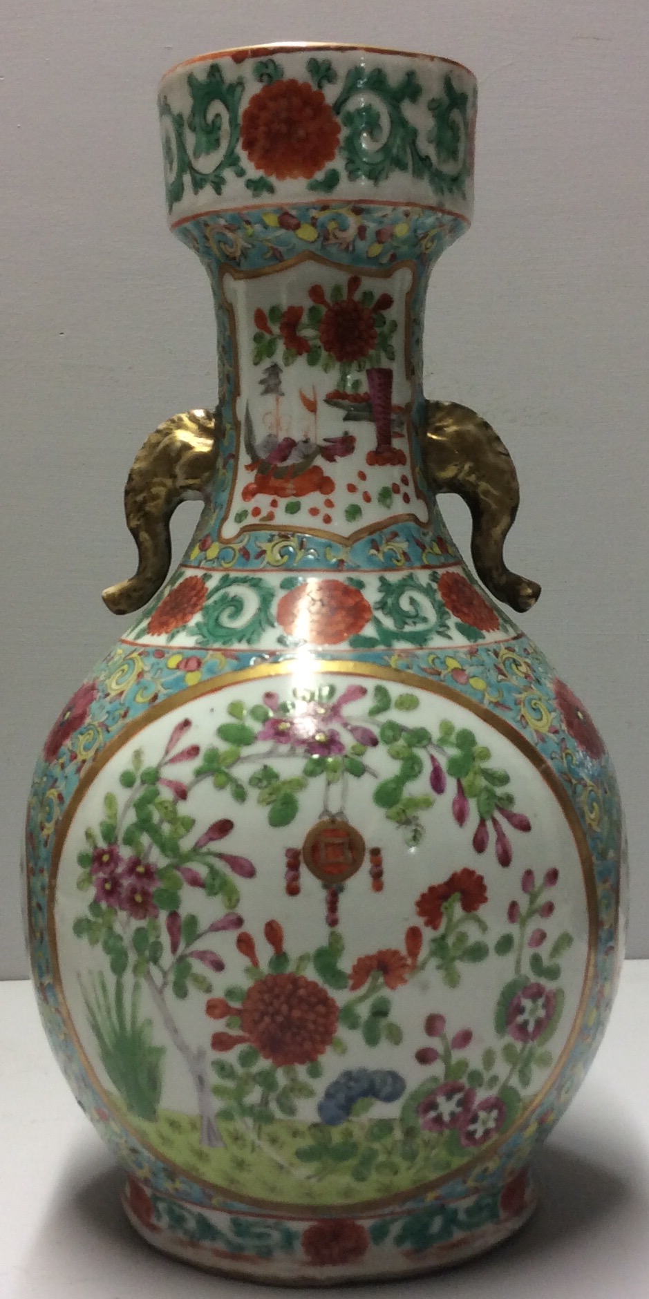 A 19TH CENTURY CHINESE PORCELAIN TURQUOISE GROUND VASE Having applied gilt elephant masks and two