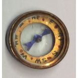 AN S.O.E. ESCAPE COMPASS (Would possibly be hidden behind a cap badge or button). Condition: in