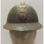 A WORLD WAR II BELGIUM ADRIAN HELMET Liner and chinstrap. Condition: surface rust but solid