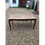 A LATE 19TH/EARLY 20TH CENTURY FRENCH FRUITWOOD FARMHOUSE TABLE The cartouche top raised on cabriole