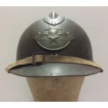 A WORLD WAR II FRENCH AVIATION HELMET Brass insignia to front, 'RF' with wings. Condition: very