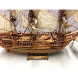H.M.S. BOUNTY, A 20TH CENTURY SCALE MODEL BOAT Complete with stand. (h 55cm x w 61cm x d 23cm)